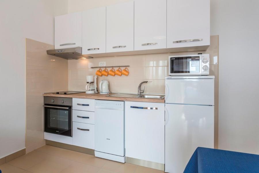 Apartmani Bezmalinovic โบล ภายนอก รูปภาพ